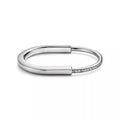 L'amour Lock bracelet Bangle in White Gold with Half Pavé Diamonds