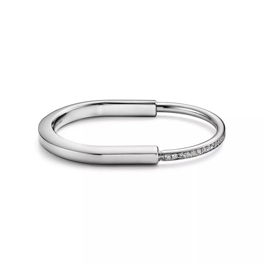 L'amour Lock bracelet Bangle in White Gold with Half Pavé Diamonds